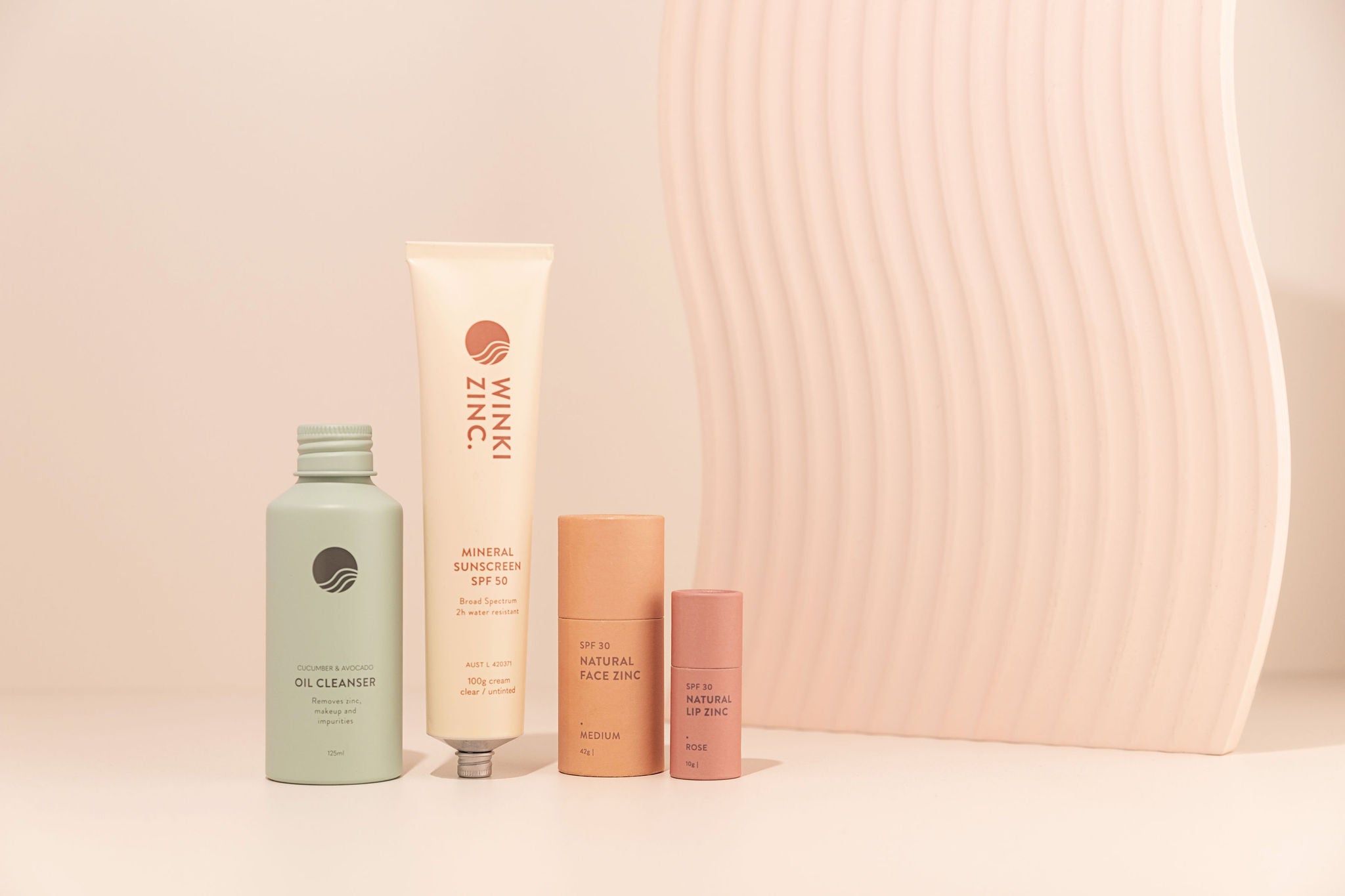 Winki Zinc natural skincare range including SPF 50 sunscreen, tinted lip and face zinc and oil cleanser. 